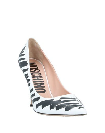 Shop Moschino Pumps In White