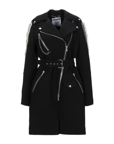 Shop Moschino Coat In Black