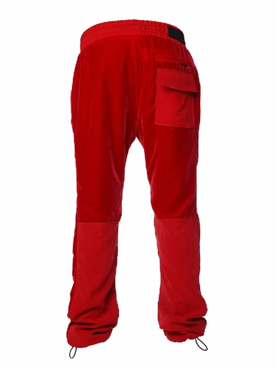 Shop Amiri Velvet Commando Sweatpants Red