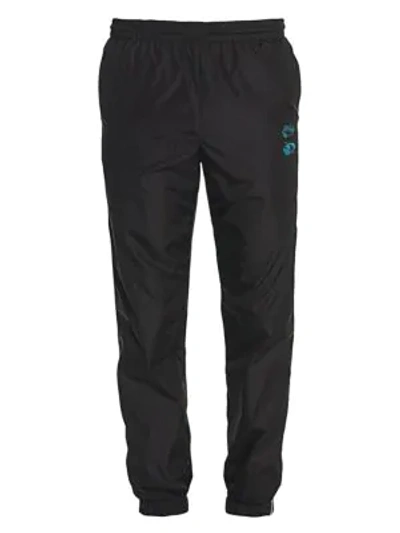Shop Off-white Arrow Track Trousers In Black