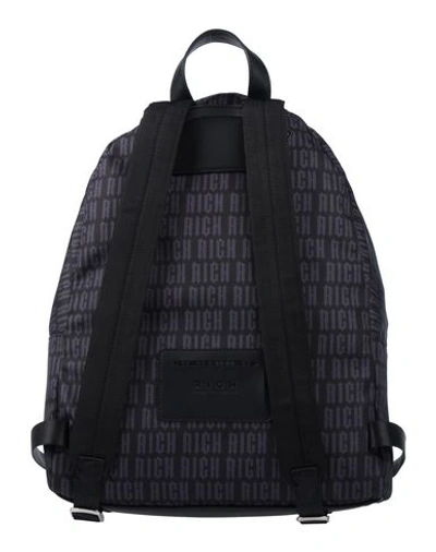 Shop John Richmond Backpack & Fanny Pack In Black