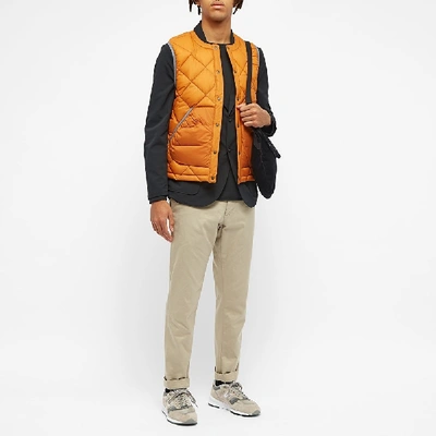 Shop And Wander Diamond Stitch Down Vest In Orange