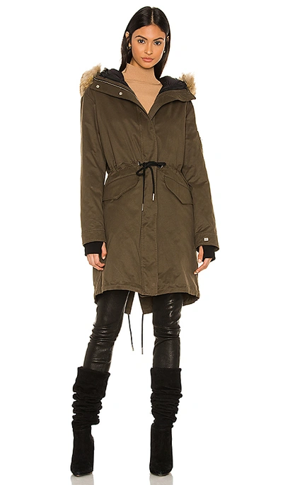 Shop Soia & Kyo Elloise Parka With Faux Fur Trim In Olive. In Army
