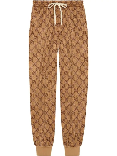 Shop Gucci Brown Men's Gg Logo Track Pants