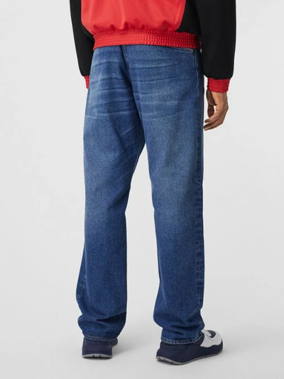 Shop Burberry Relaxed Fit Reconstructed Washed Denim Jeans In Indigo Blue