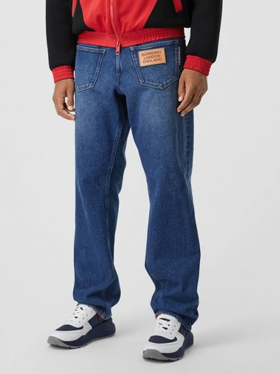 Shop Burberry Relaxed Fit Reconstructed Washed Denim Jeans In Indigo Blue