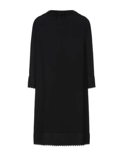 Shop Dolce & Gabbana Coat In Black