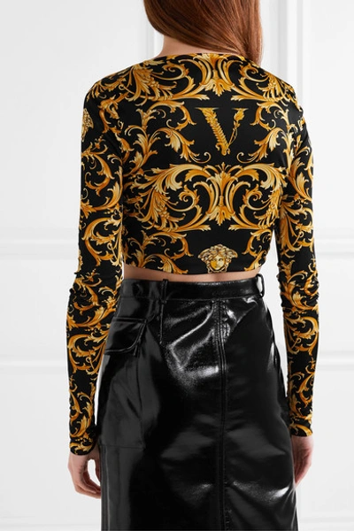 Shop Versace Cropped Embellished Printed Satin-jersey Top In Black