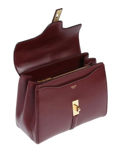 Shop Celine Handbag In Maroon