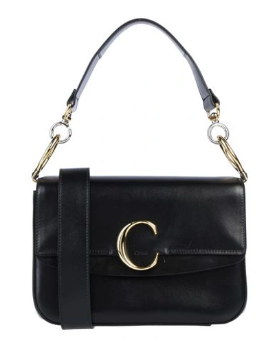 Shop Chloé Handbag In Black