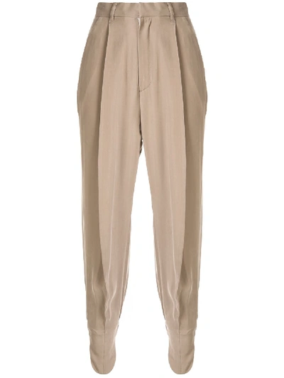 Shop Akira Naka Pleated Tapered Trousers In Brown