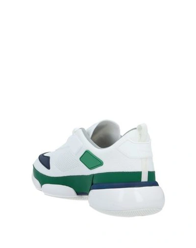 Shop Prada Sneakers In White