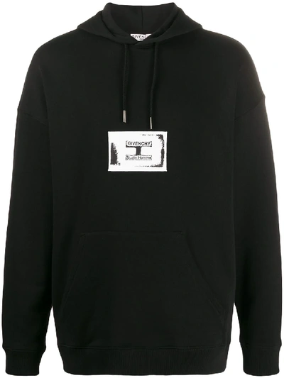 Shop Givenchy Contrasting Logo Patch Hoodie In Black