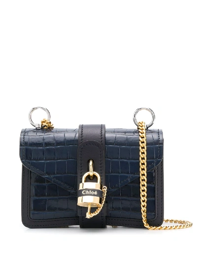 Shop Chloé Mini Aby Chain Crocodile-effect Shoulder Bag In Blue