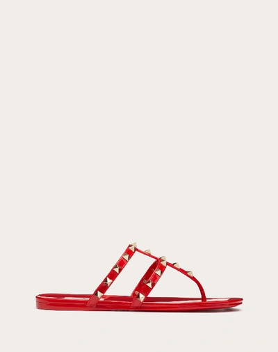 Shop Valentino Garavani Rockstud Flat Rubber Sandal In Rouge Pur