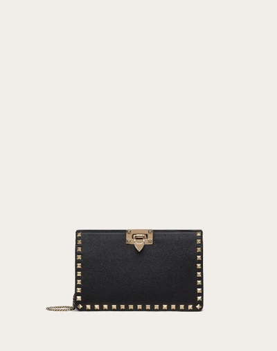 Shop Valentino Garavani Rockstud Calfskin Clutch In Black