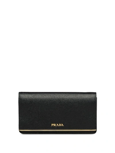 Shop Prada Mini Logo Plaque Crossbody Bag In Black