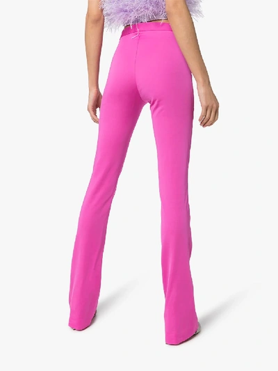 Shop Versace High Waist Flared Trousers In Pink