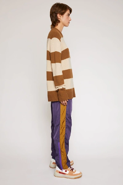 Shop Acne Studios Oversized Striped Sweater Beige/camel