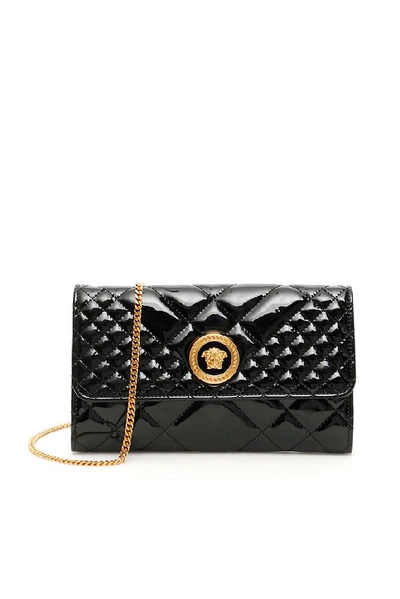 Shop Versace Medusa Quilted Clutch Bag In Black