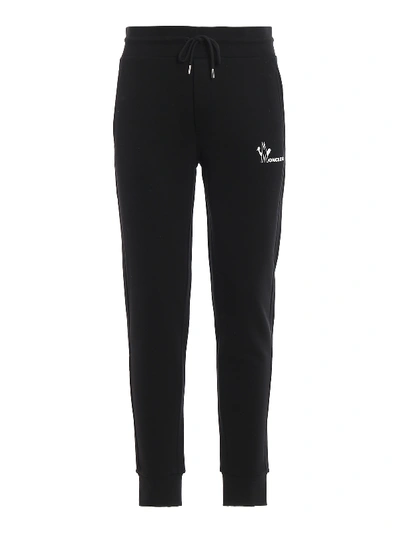 Shop Moncler Contrasting Logo Jogging Pants In Black