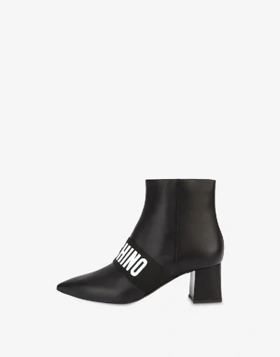 Shop Moschino Elastic Band Leather Ankle Boots In Black