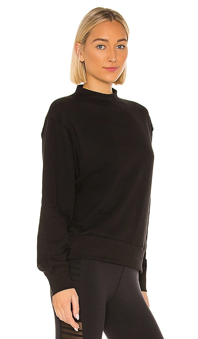 Shop Alo Yoga Alo Freestyle Sweatshirt In Black.