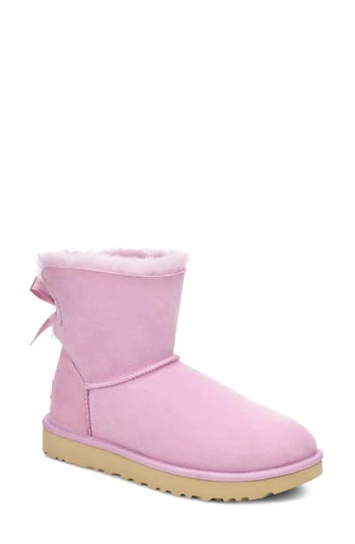 Shop Ugg Mini Bailey Bow Ii Genuine Shearling Bootie In California Aster Suede