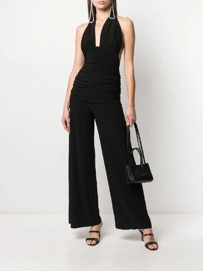 Shop Norma Kamali Halter Bill Jumpsuit In Black