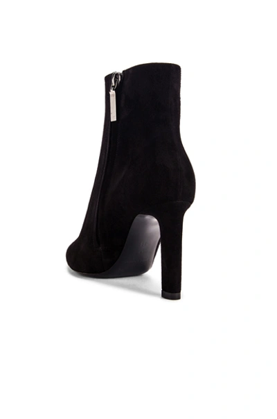 Shop Saint Laurent Kate Zip Ankle Booties In Black