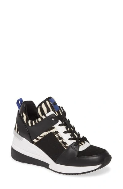 Shop Michael Michael Kors Georgie Wedge Sneaker In Zebra Print Multi