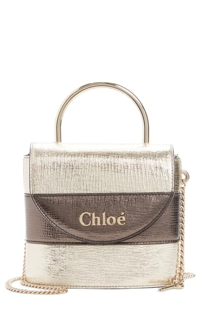 Shop Chloé Aby Lock Metallic Leather Crossbody Bag In Gold