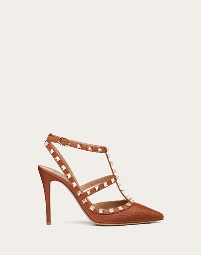 Shop Valentino Garavani Rockstud Grainy Leather Ankle Strap Pump 100 Mm In Saddle Brown