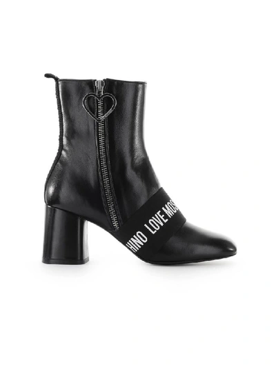 Shop Love Moschino Black Leather Logo Ankle Boot In Nero