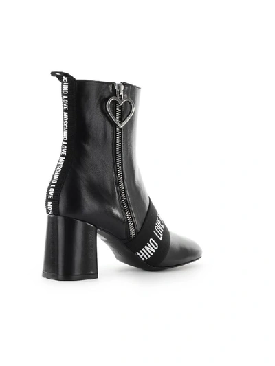 Shop Love Moschino Black Leather Logo Ankle Boot In Nero