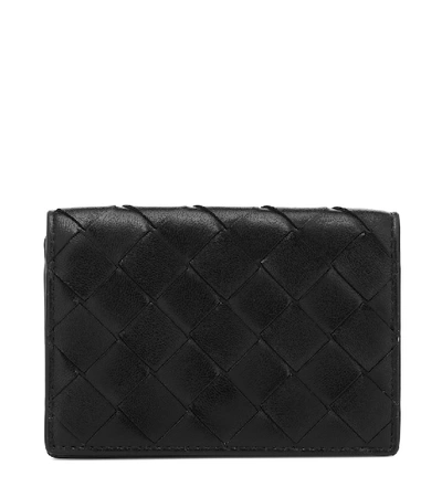 Shop Bottega Veneta Intrecciato Leather Flap Wallet In Black