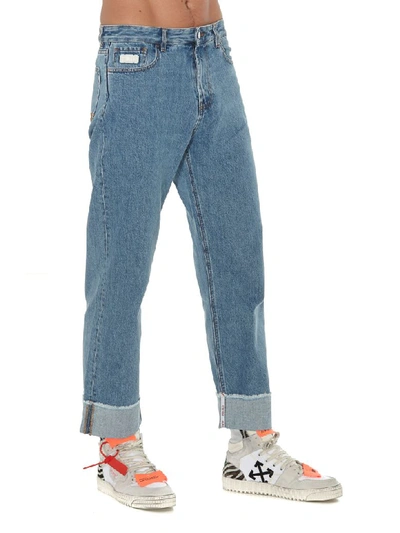 Shop Gcds Wide Fit Logo Jeans In Light Blue
