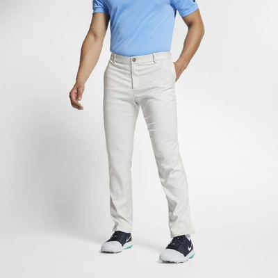 Shop Nike Men's Flex Golf Pants In White