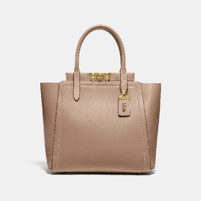 Shop Coach Troupe Tote In Brass/stone