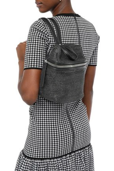 Shop Kara Woman Leather-paneled Faux Raffia Woven Backpack Black