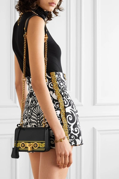 Shop Versace Embellished Printed Leather Shoulder Bag In Black