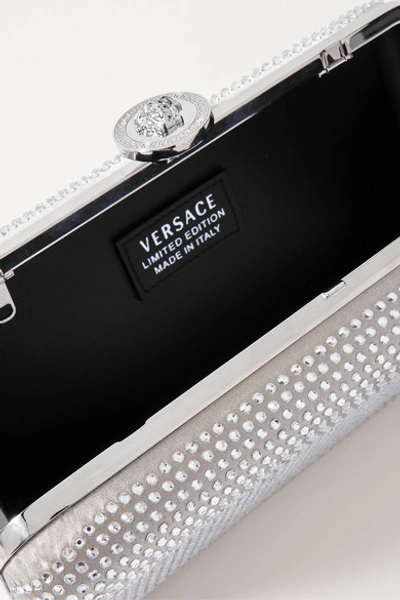 Shop Versace Crystal-embellished Metallic Satin Clutch In Silver