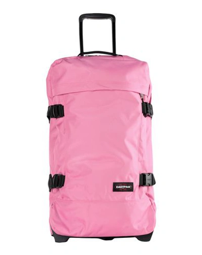 Shop Eastpak Wheeled Luggage In Pink