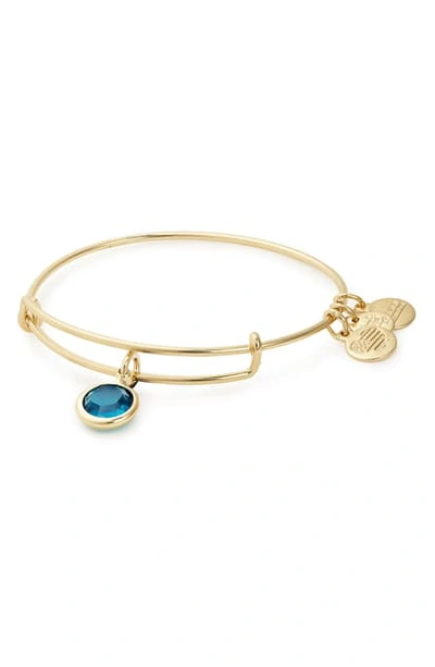 Shop Alex And Ani Color Code Adjustable Wire Bangle In December - Blue Zircon/ Gold