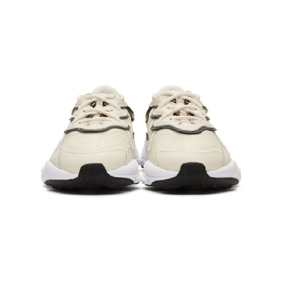 Shop Adidas Originals Off-white Ozweego Sneakers