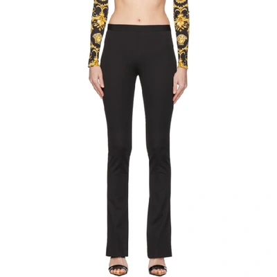 Shop Versace Black Flared Trousers In A1008 Black