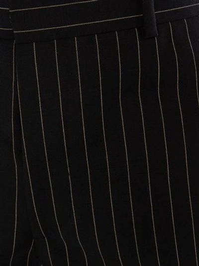 Shop Alexander Mcqueen Pinstripe Pants In Black/white
