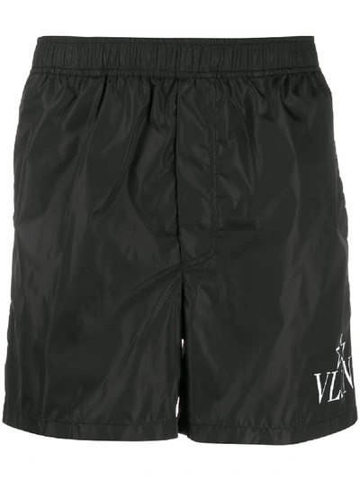 Shop Valentino Vltn Logo Print Swimshorts In 黑色