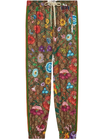 Shop Gucci Flora Gg Supreme Pattern Track Pants In Green
