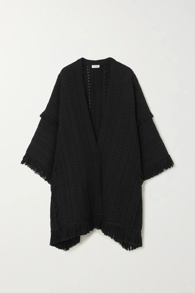 Shop Saint Laurent Fringed Crochet-knit Wool Cape In Black